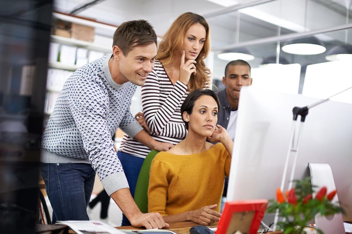 Marketers reviewing Copy.ai generated content