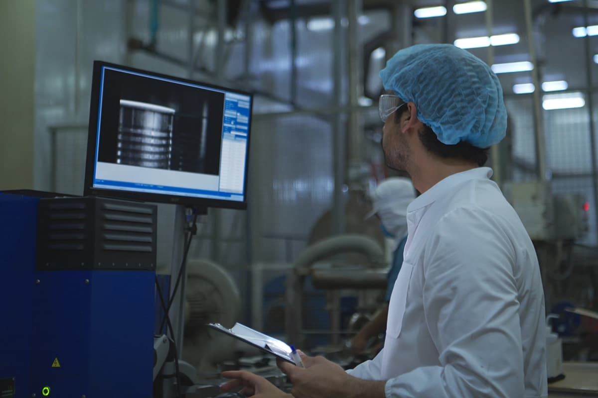 Production Control Supervisor Inspects